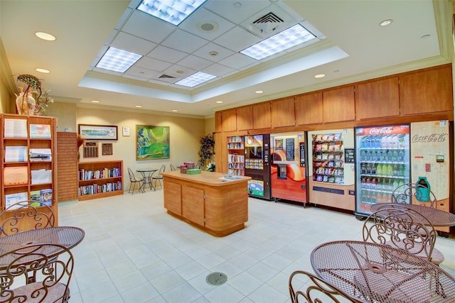 office with visible vents, recessed lighting, crown molding, and a raised ceiling