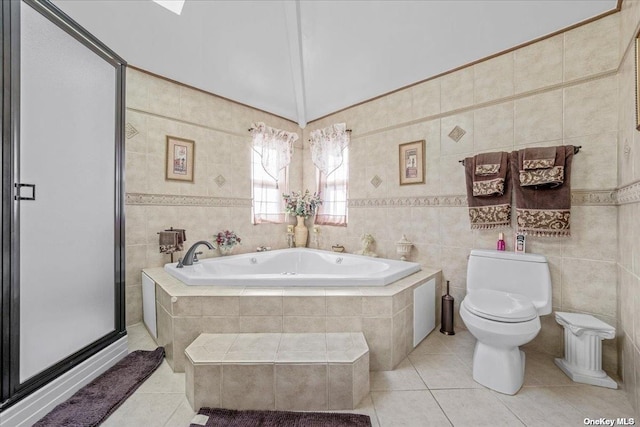 bathroom with toilet, tile walls, a shower stall, tile patterned flooring, and a bath