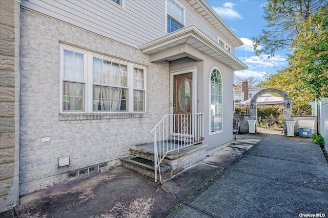 property entrance featuring fence