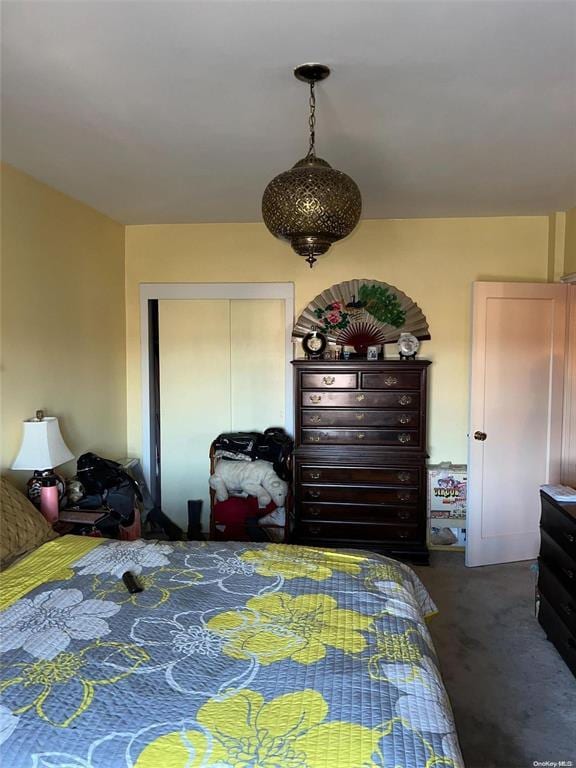 carpeted bedroom featuring a closet