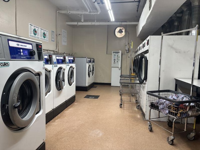 shared laundry area featuring tile patterned floors, stacked washer and dryer, and independent washer and dryer