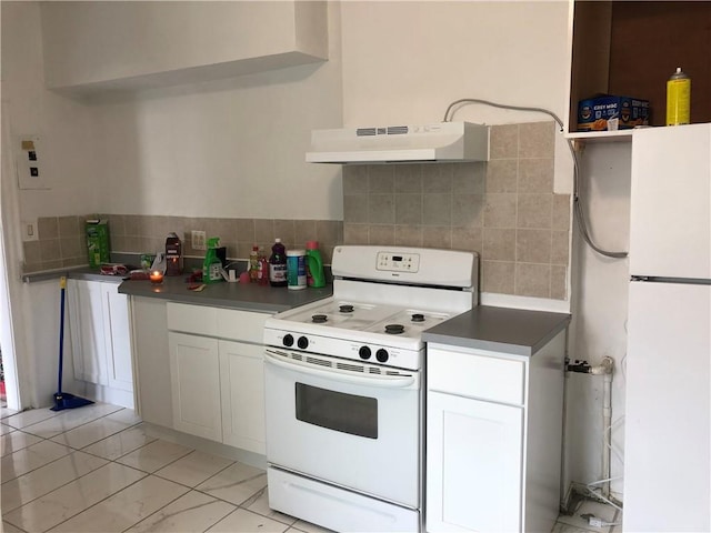 kitchen featuring white cabinetry, white appliances, backsplash, and under cabinet range hood