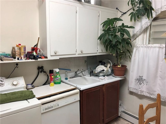 kitchen with washer / clothes dryer, a sink, decorative backsplash, light countertops, and dishwasher