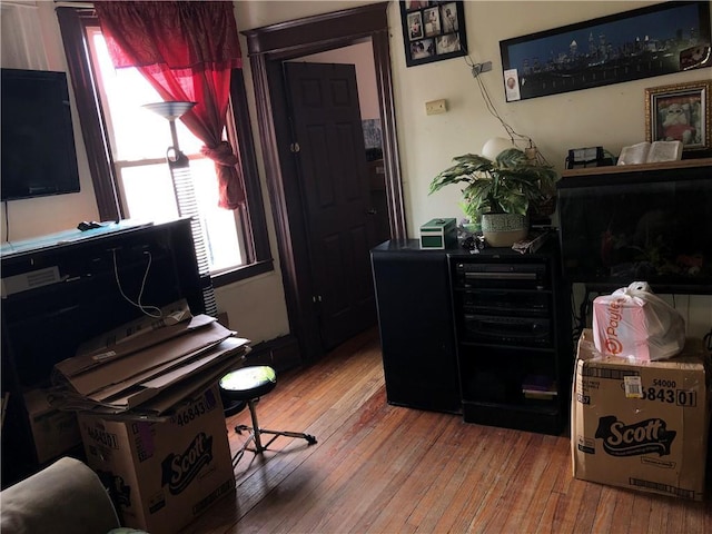 office with light wood-type flooring