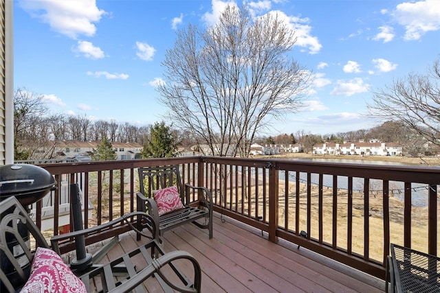 wooden deck with a residential view