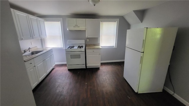 kitchen with a sink, white appliances, under cabinet range hood, and white cabinetry