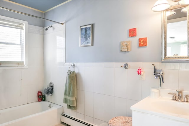 bathroom featuring a baseboard heating unit, shower / bath combination, vanity, wainscoting, and tile walls