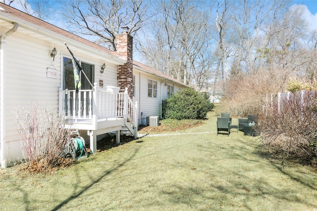 view of yard featuring central AC unit