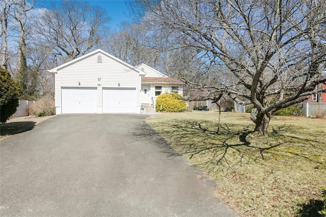 view of side of property featuring driveway