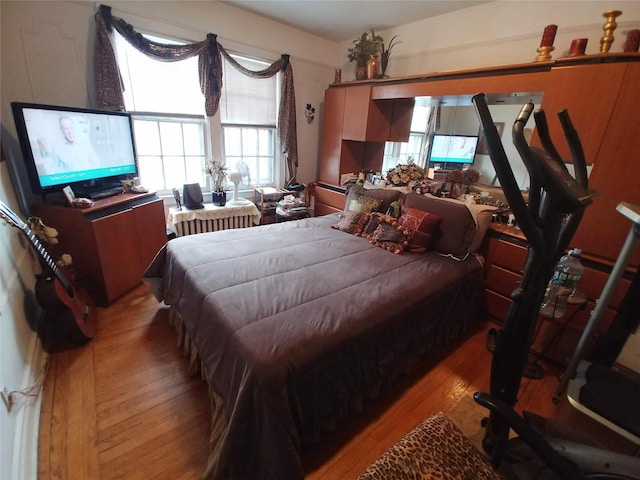 bedroom featuring hardwood / wood-style floors