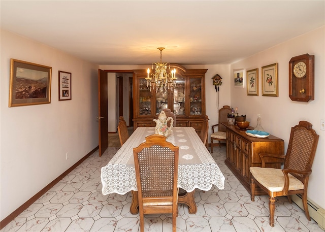 dining room featuring a baseboard heating unit, baseboards, and a chandelier