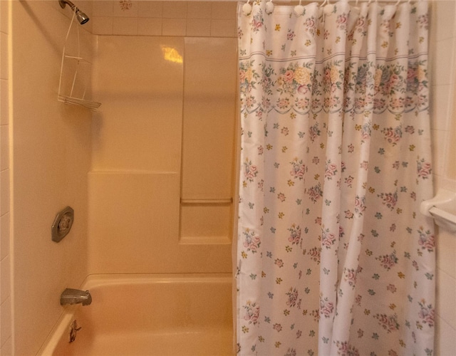 full bath featuring shower / bathtub combination with curtain