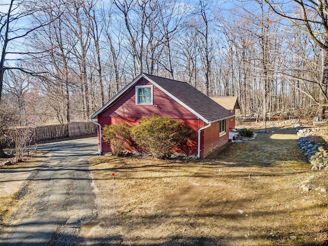 3 Rodman Pl, Spring Valley, NY 10977 - view of home's exterior featuring driveway and a shingled roof