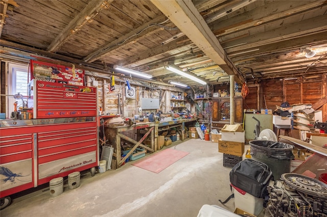 basement with a workshop area