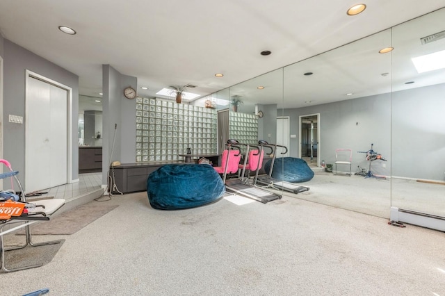 interior space featuring a baseboard heating unit, recessed lighting, carpet, and visible vents