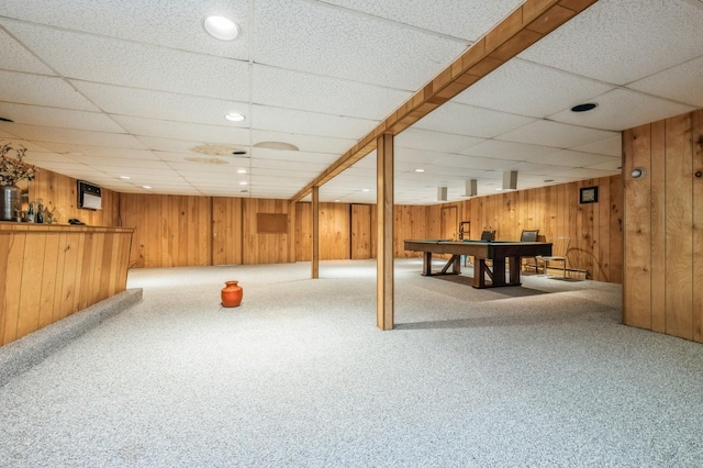 game room with wooden walls, pool table, indoor bar, and carpet