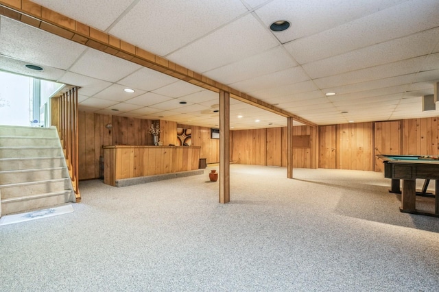 recreation room featuring wood walls, pool table, indoor bar, and carpet floors