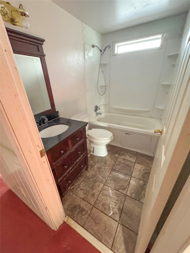 full bathroom featuring toilet, bathtub / shower combination, and vanity