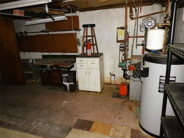 utility room featuring water heater