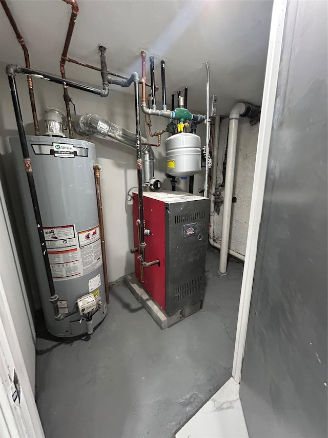 utility room with gas water heater and a heating unit