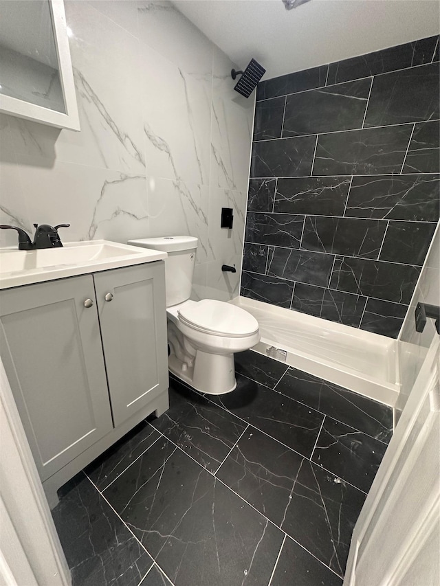 223-45 113th Dr, Queens Village, NY 11429 - full bath with marble look tiles, vanity, a stall shower, and tile walls