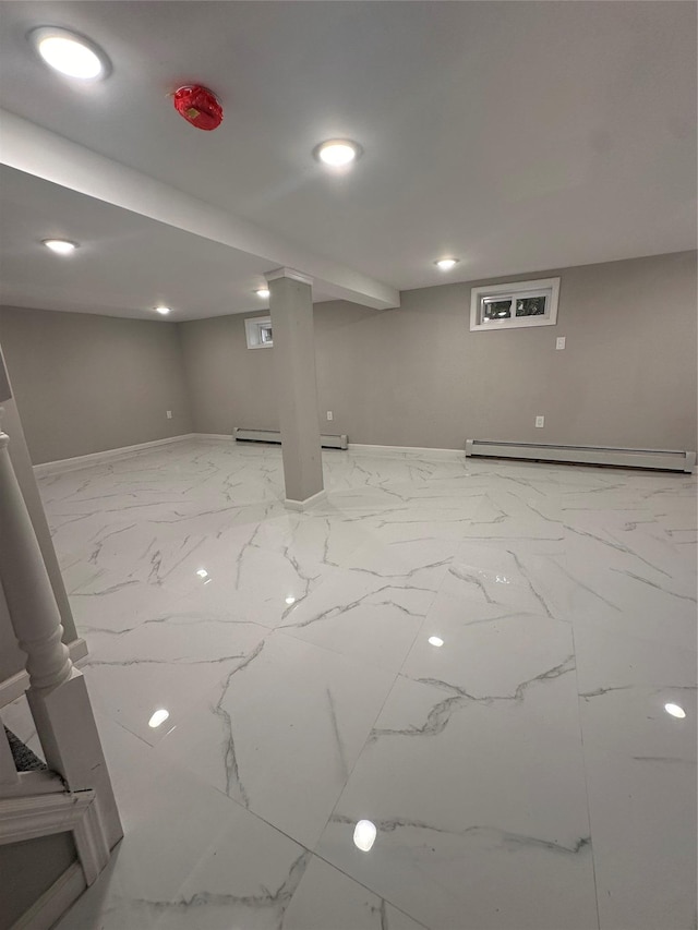 223-45 113th Dr, Queens Village, NY 11429 - finished basement featuring baseboard heating, light marble finish flooring, and recessed lighting