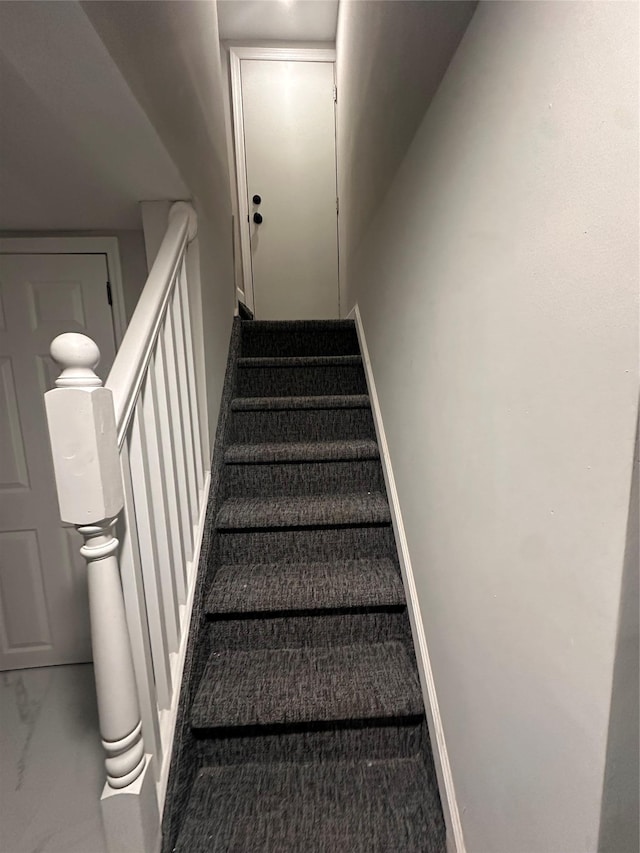 223-45 113th Dr, Queens Village, NY 11429 - staircase featuring baseboards and marble look tile flooring