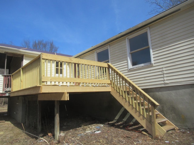 exterior space with stairs and a wooden deck