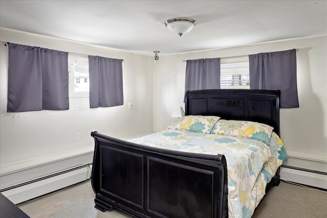 bedroom featuring carpet flooring and a baseboard radiator