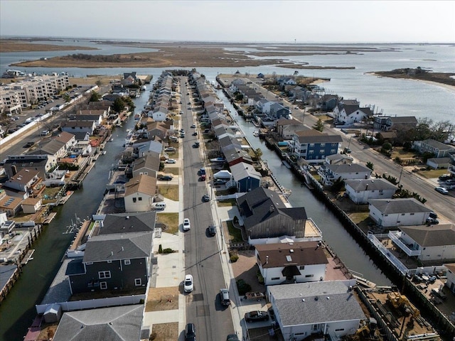 bird's eye view featuring a residential view and a water view