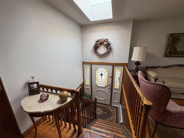 502 Nassau Ave, Freeport, NY 11520 - foyer with a skylight and wood-type flooring