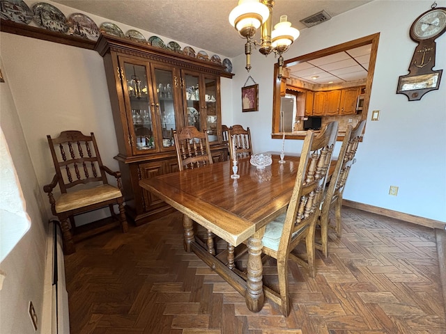 502 Nassau Ave, Freeport, NY 11520 - dining area featuring baseboards, visible vents, and a paneled ceiling