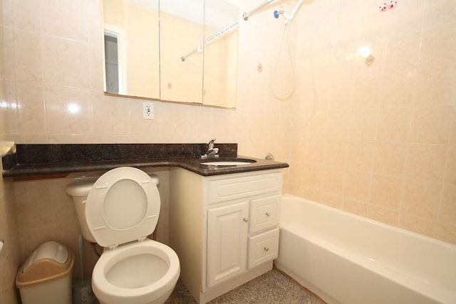 bathroom with toilet, backsplash, shower / tub combination, tile walls, and vanity