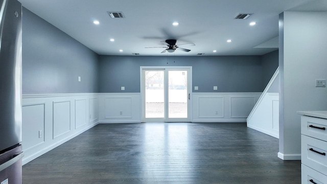 12 Meridian Rd, Levittown, NY 11756 - empty room with dark wood-style floors, visible vents, recessed lighting, and a ceiling fan