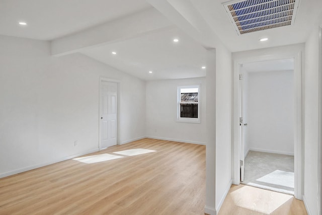 interior space with recessed lighting, light wood-style floors, visible vents, and baseboards