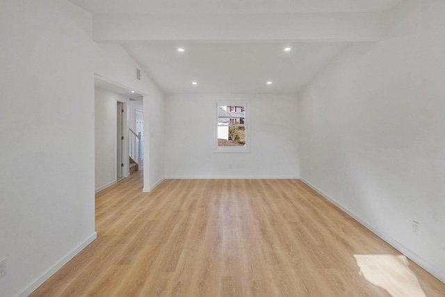 unfurnished room featuring recessed lighting, light wood-style flooring, visible vents, and baseboards