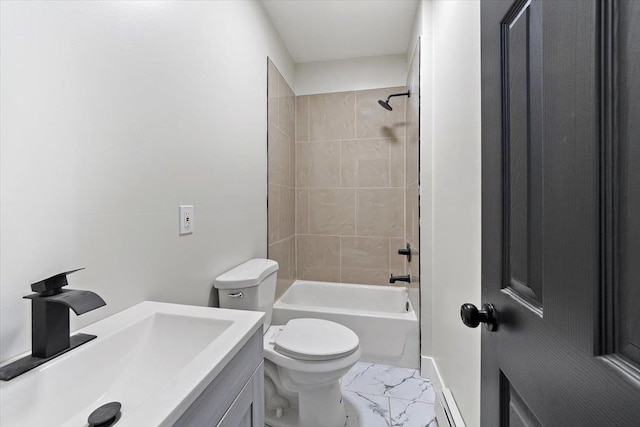 bathroom featuring marble finish floor, toilet, vanity, and shower / bathing tub combination