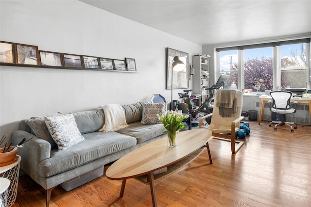 333 Bronx River Rd Unit 123, Yonkers, NY 10704 - living area with a desk and wood finished floors