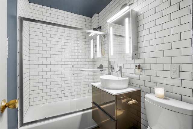 333 Bronx River Rd Unit 123, Yonkers, NY 10704 - full bathroom with toilet, enclosed tub / shower combo, tasteful backsplash, and vanity