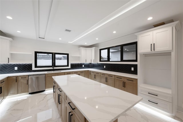 kitchen featuring open shelves, marble finish floor, and a center island