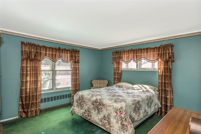 carpeted bedroom featuring multiple windows and radiator