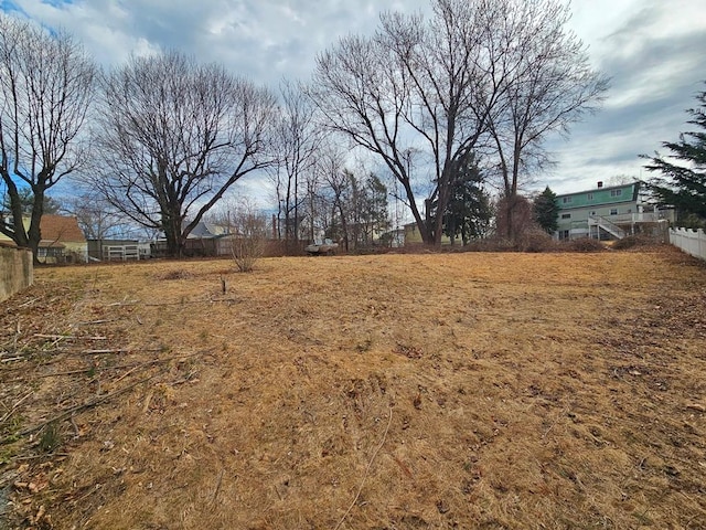 view of yard featuring fence