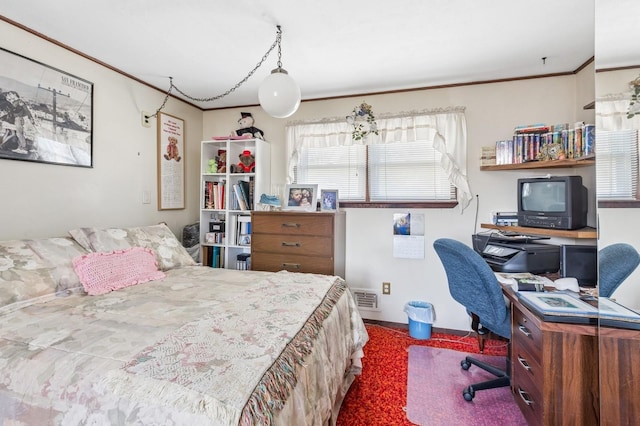 bedroom with visible vents and ornamental molding