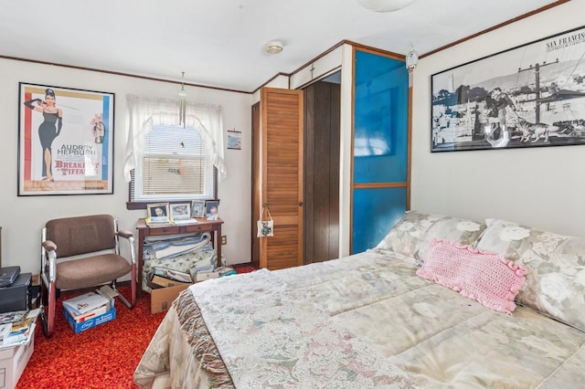 bedroom featuring a closet and crown molding