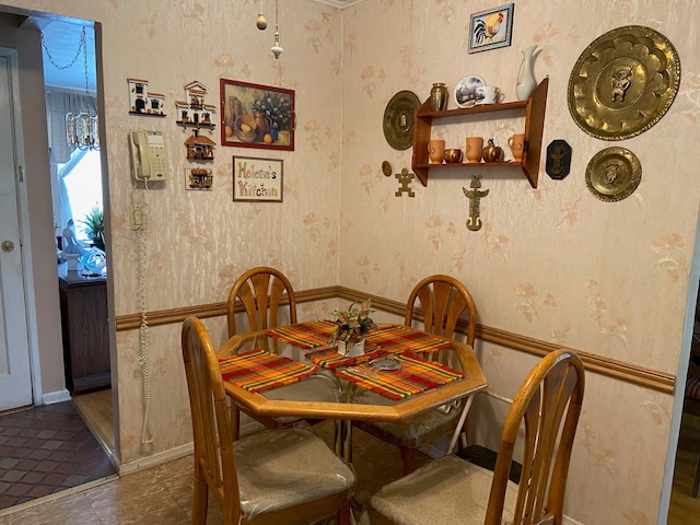 tiled dining space with wallpapered walls