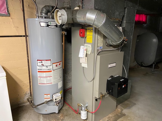 utilities with gas water heater, heating fuel, and heating unit