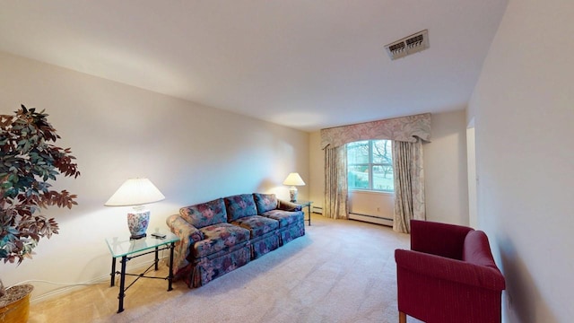 carpeted living room featuring visible vents and baseboard heating