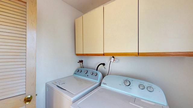 laundry area featuring cabinet space and washing machine and dryer