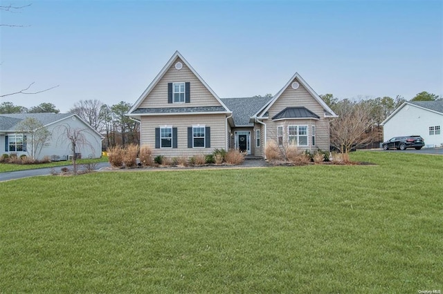 view of front of house with a front lawn