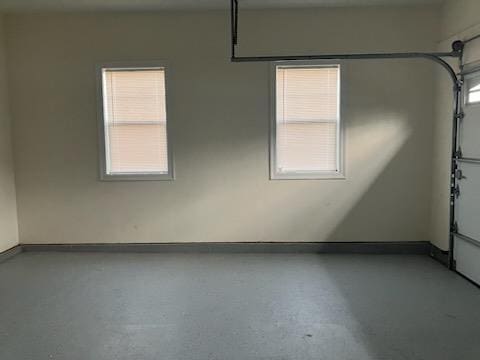 garage featuring baseboards